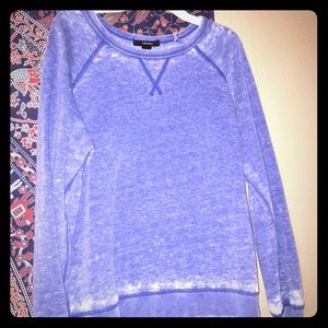 Faded blue sweater
